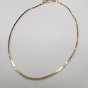 14k yellow gold box chain bravelet, 7 inches.